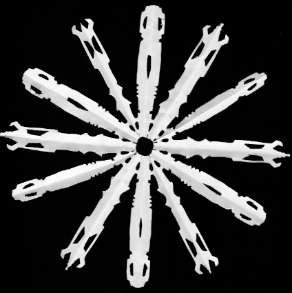 A paper snowflake made up of 12 sonic screwdrivers of two different styles.